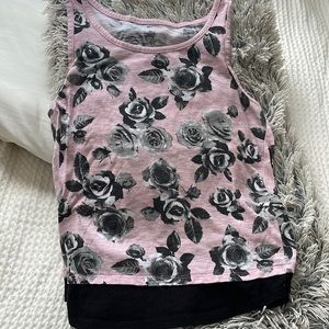 Size 14 justice tank but fits like a xs or small